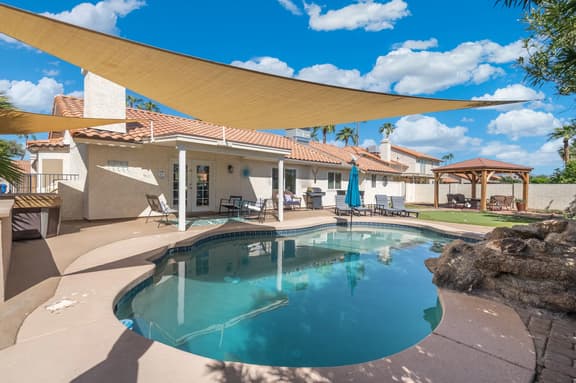 Modern 4BR Oasis with Pool, Huge Yard & Putting Green - Image 1